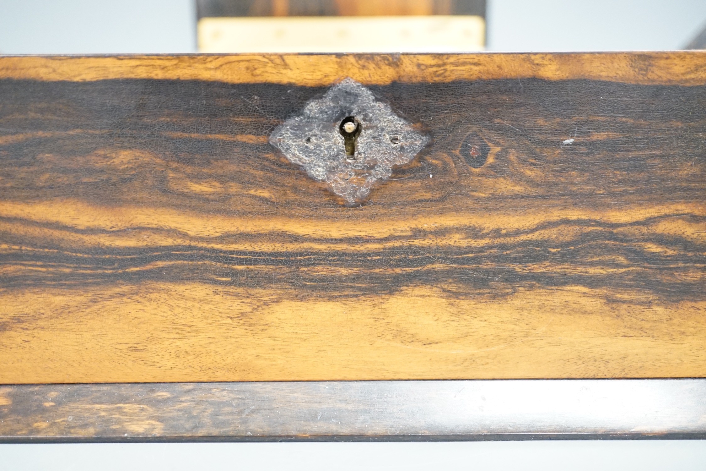 A Victorian calamander veneered humidor / three divisional caddy together with a small barometer and bulkhead clock (3), humidor 31cms wide